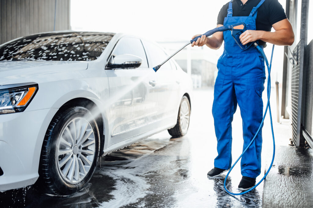Car with a High-Pressure Washer